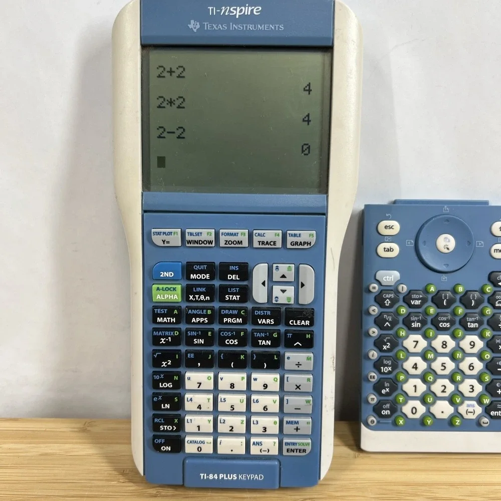 Texas Instruments Graphing Calculator TI-Nspire Touchpad & TI-84 Plus Keypad